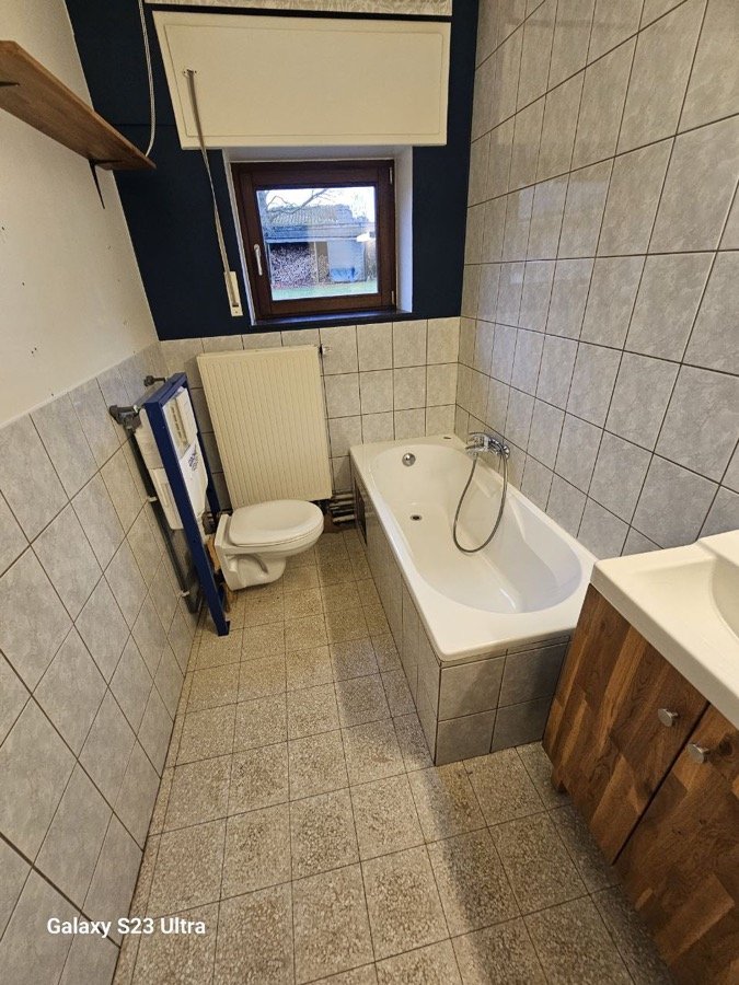 Baignoire avant remplacement par une douche sur mesure